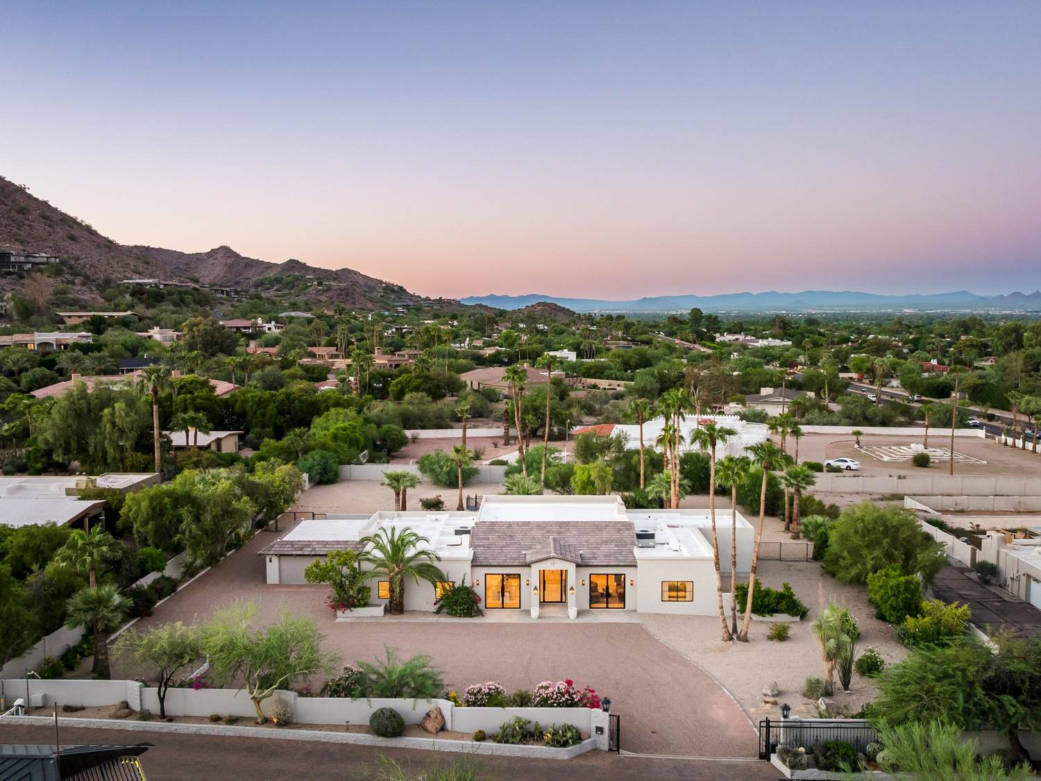 Private gated .98 flat acre at dusk