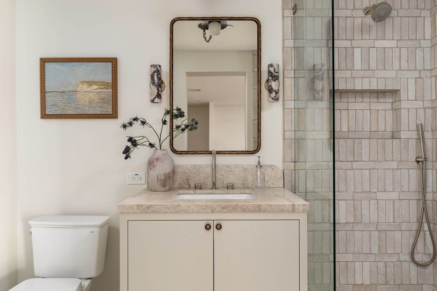 Quartzite vanity & zellige tile shower